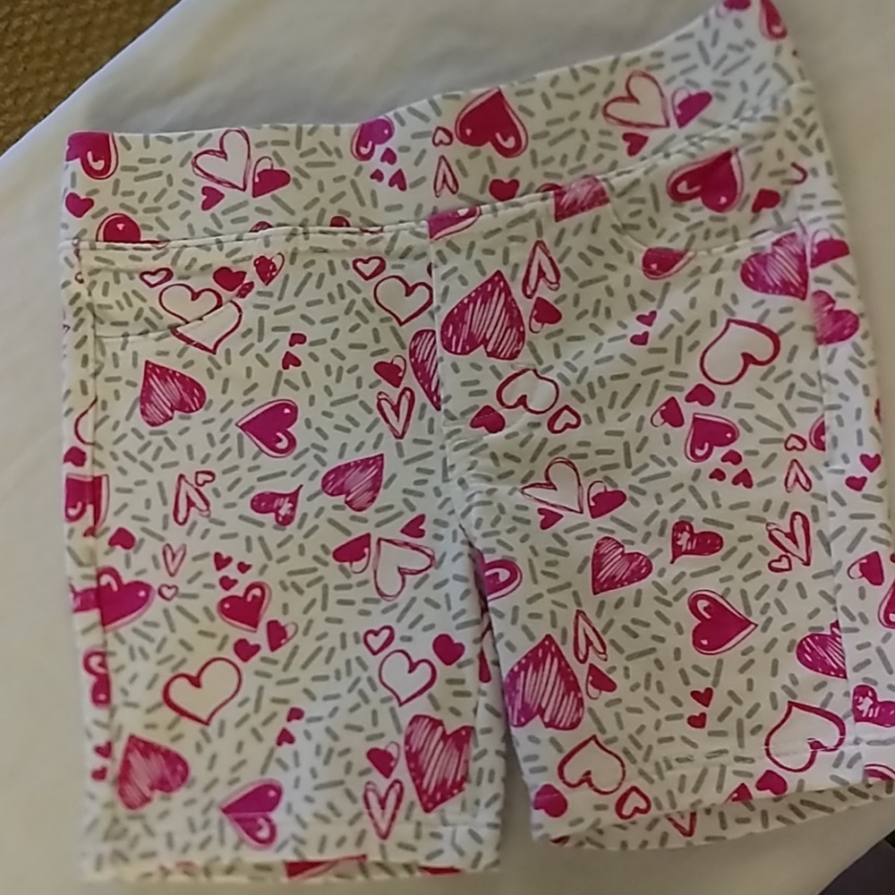 Spandex shorts with pink hearts